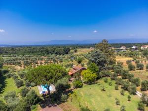 an aerial view of a house in a field with trees at Holiday Home Podere Cerbaia - SMR100 by Interhome in Santa Maria a Monte