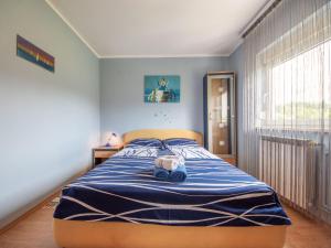 Posteľ alebo postele v izbe v ubytovaní Apartment Markulin by Interhome