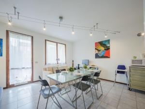 a dining room with a table and chairs at Apartment Villaggio 5 Terre-4 by Interhome in Soviore