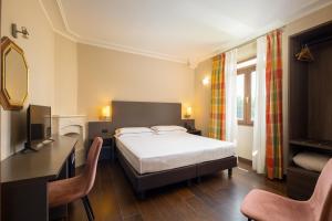 Posteľ alebo postele v izbe v ubytovaní Hotel Villa Betania