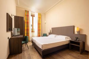 Posteľ alebo postele v izbe v ubytovaní Hotel Villa Betania