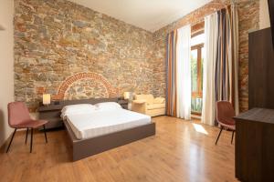 Posteľ alebo postele v izbe v ubytovaní Hotel Villa Betania