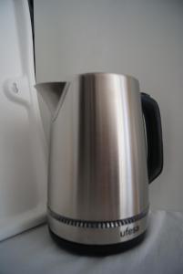 a coffee pot sitting on top of a counter at 3 L's STAY in Castro Daire