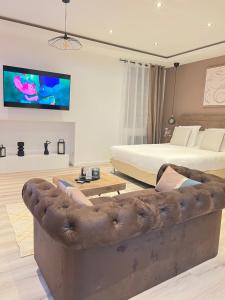 Televisyen dan/atau pusat hiburan di Eden Spa ST Etienne