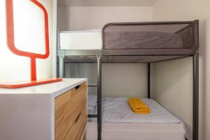 Katil atau katil-katil dalam bilik di Grand Roc A - 3 bedrooms Apartment Next to skilift - By Cozee Rentals