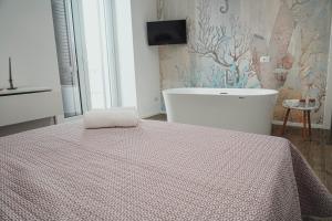Postel nebo postele na pokoji v ubytování Casa Vacanza Stomar