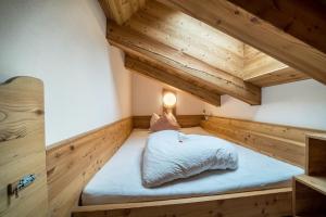 Postel nebo postele na pokoji v ubytování Ferienhaus Larch Soge Apt Helmuth
