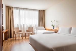 Postel nebo postele na pokoji v ubytování Hotel SB Diagonal Zero 4 Sup