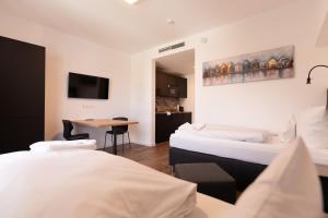 Katil atau katil-katil dalam bilik di Living Neuburg