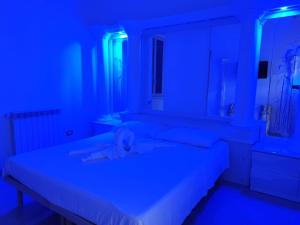 Letto o letti in una camera di B&B IL TEMPIO