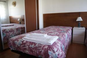 Кровать или кровати в номере LG STAY
