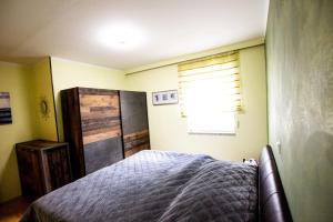 Postel nebo postele na pokoji v ubytování Ferienwohnung in Feldkirchen Dagmar und Christian!