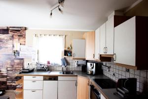 Kuchyň nebo kuchyňský kout v ubytování Ferienwohnung in Feldkirchen Dagmar und Christian!