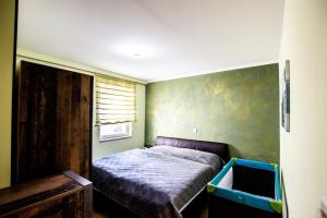 Postel nebo postele na pokoji v ubytování Ferienwohnung in Feldkirchen Dagmar und Christian!