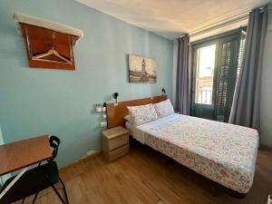 Ένα ή περισσότερα κρεβάτια σε δωμάτιο στο CH Casillas