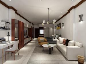 a living room with a couch and a table at ARTIST GOLDEN LOFT DUPLEX - TRIPLEX Paris - Vientiane Homestay - 3 Luxury Apartments in Vientiane