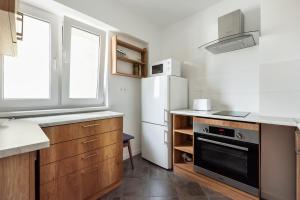 Majoituspaikan Czerniakowska Comfort Apartment keittiö tai keittotila
