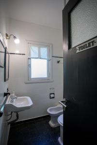 Vannituba majutusasutuses Green House Bariloche +53 fotot