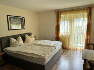 Letto o letti in una camera di Haus Sonnenspitze - Fam. Nessler