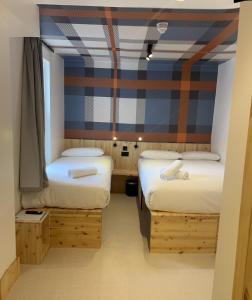 Postel nebo postele na pokoji v ubytování easyHotel Paddington