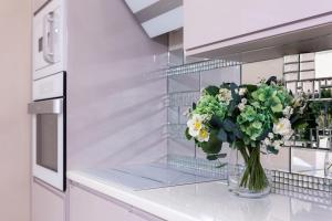 A kitchen or kitchenette at Xen Premium Apartment