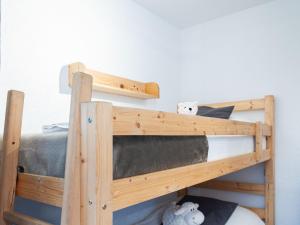 Letto o letti in una camera di Apartment Lake Placid B5 by Interhome