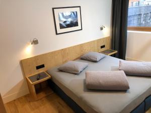 Postel nebo postele na pokoji v ubytování Apartment Catrina 3-Zimmer Premium Apartment by Interhome