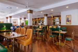 Reštaurácia alebo iné gastronomické zariadenie v ubytovaní Darovanský Dvůr - Wellness & Golf Hotel