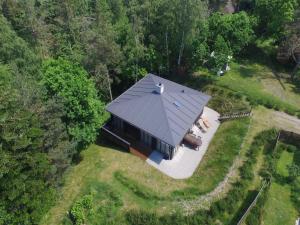 an overhead view of a house with a black roof at Holiday Home Jonce - 250m from the sea in Sealand by Interhome in Vejby