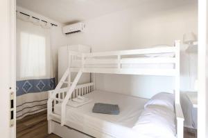Postel nebo postele na pokoji v ubytování Villa Lara