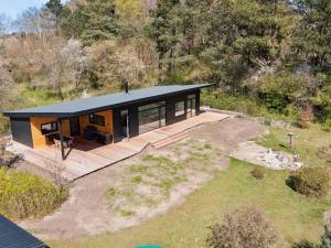 an overhead view of a house on a hill at Holiday Home Toska - all inclusive - 100m to the inlet in Sealand by Interhome in Rørvig