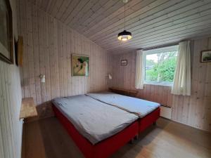 Katil atau katil-katil dalam bilik di Holiday Home Rikus - 300m from the sea in SE Jutland by Interhome
