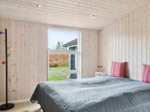 Postel nebo postele na pokoji v ubytování Holiday Home Helke - 100m to the inlet in SE Jutland by Interhome
