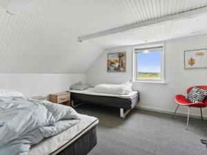 En eller flere senge i et værelse på Holiday Home Swaantje - 150m to the inlet in The Liim Fiord by Interhome