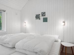 Postel nebo postele na pokoji v ubytování Holiday Home Herta in SE Jutland by Interhome