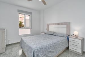 Posteľ alebo postele v izbe v ubytovaní Apartamento Familiar Torrox A65
