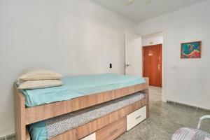 Posteľ alebo postele v izbe v ubytovaní Apartamento Familiar Torrox A65