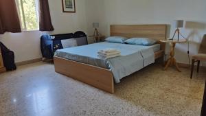 Ένα ή περισσότερα κρεβάτια σε δωμάτιο στο Stunning Villa with Pool, Table tennis, Table soccer and a Pool table