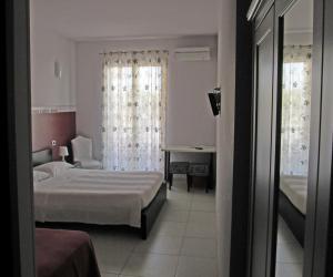 Postel nebo postele na pokoji v ubytování B&B Persi Nel Sud, Pozzallo