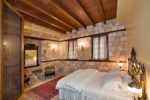 Ένα ή περισσότερα κρεβάτια σε δωμάτιο στο Kaucuk Otel +73 φωτογραφίες