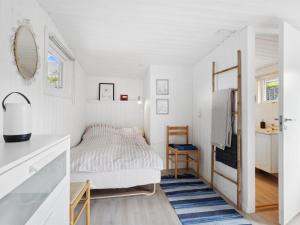 En eller flere senge i et værelse på Holiday Home Kielo - all inclusive - 200m to the inlet by Interhome