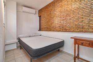 Posteľ alebo postele v izbe v ubytovaní Apartamento primera linea A01 + 14 fotografií