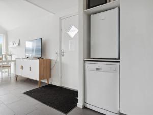 TV o dispositivi per l'intrattenimento presso Apartment Birla - 400m from the sea in NW Jutland by Interhome