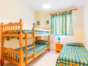 Postel nebo postele na pokoji v ubytování Apartment Mar de Oropesa I by Interhome