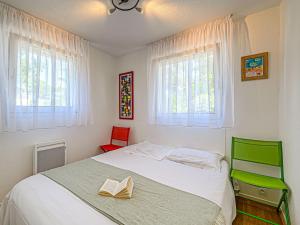 Katil atau katil-katil dalam bilik di Apartment Les Horizons-2 by Interhome