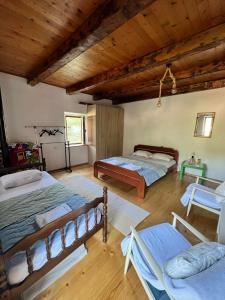 Ένα ή περισσότερα κρεβάτια σε δωμάτιο στο Lake Point Dodoši