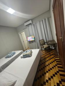 Postel nebo postele na pokoji v ubytování Hotel Dom Marechal neoclássico