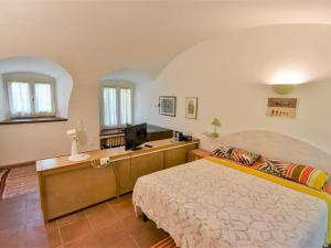 En eller flere senge i et værelse på Holiday Home La Casa del Nonno by Interhome