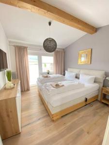 Postel nebo postele na pokoji v ubytování Penthouse in Sonthofen
