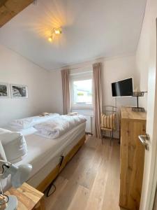 Postel nebo postele na pokoji v ubytování Penthouse in Sonthofen